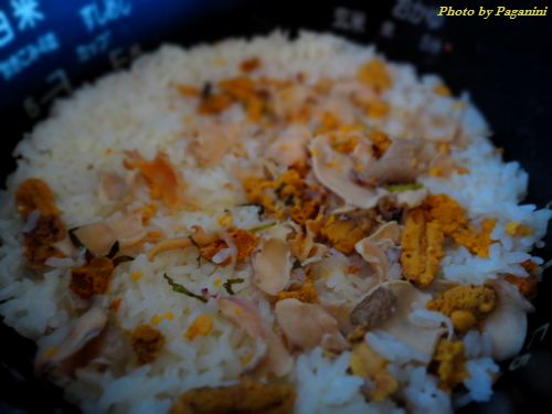 rice seasoned and cooked with various ingredients